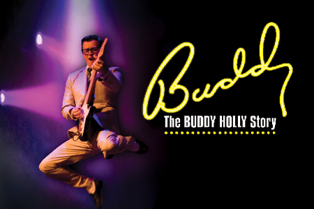 Image of Buddy Holly with a guitar