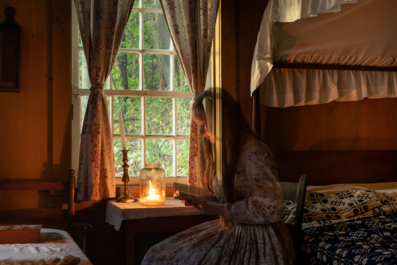 A ghostly figure reading in the window at Discovery harbour